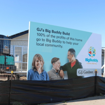 Large sign outside construction site.